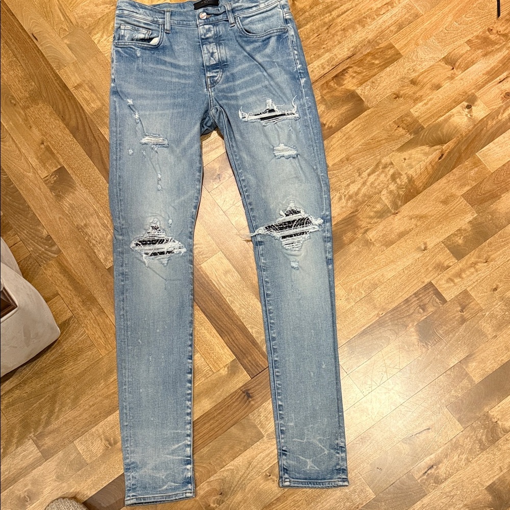 Distressed Light Blue Jeans
